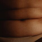 Detailed close-up of human skin highlighting natural texture and folds.