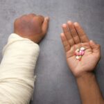 person holding babys hand
